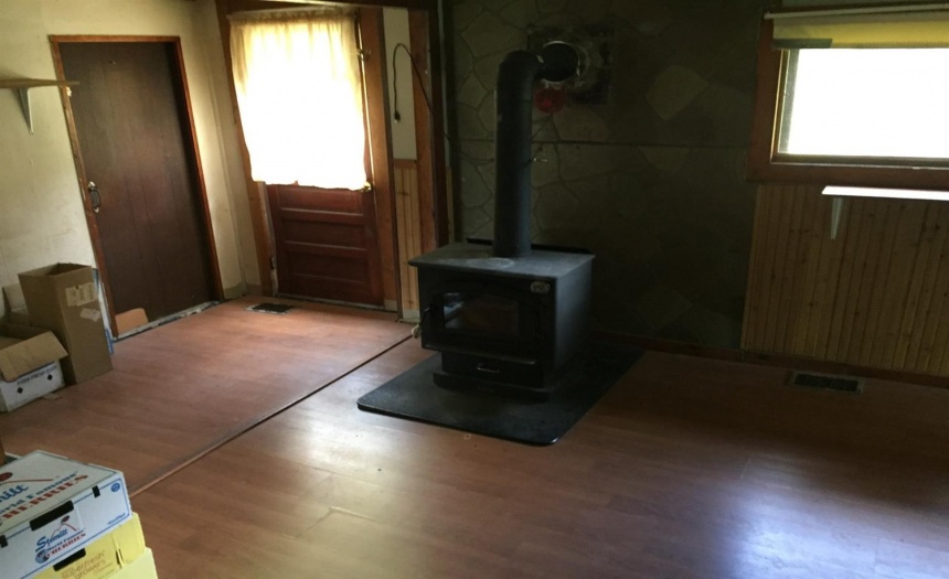 Woodburning stove heats this space nicely.