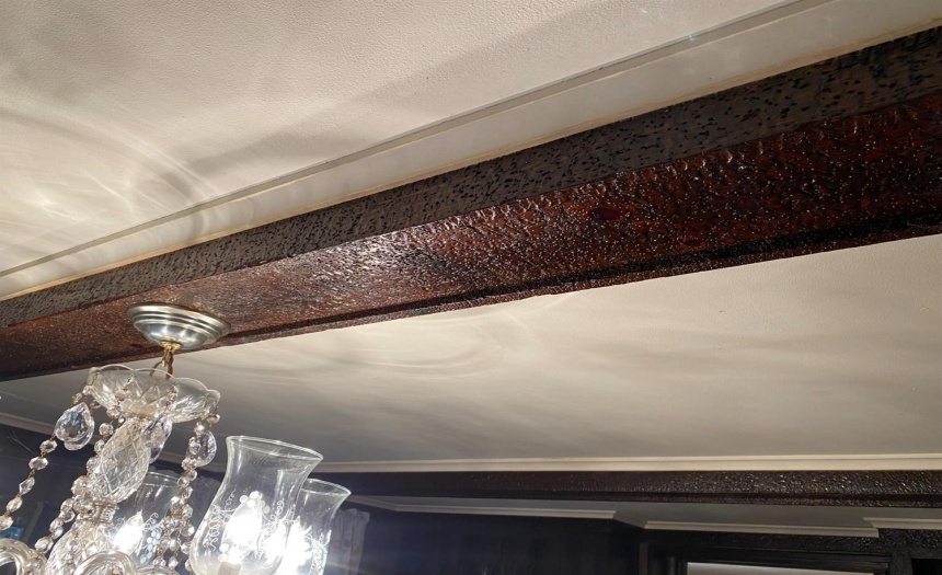 Wooden beams on ceiling.