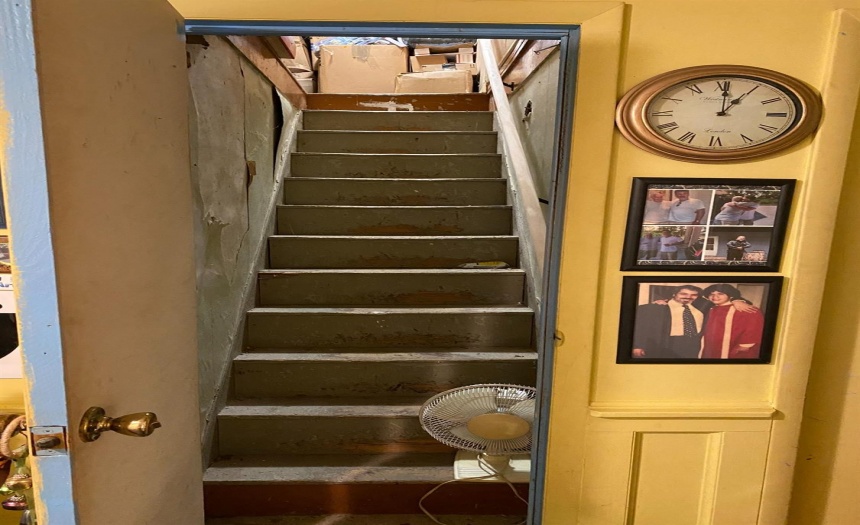 Upstairs hallway to unfinished area of house. 3 additional rooms.