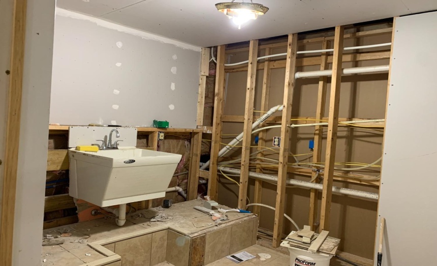 Unfinished Laundry room off garage