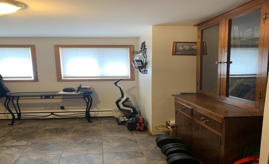 Mud room off the garage, you can hook the washer and dryer up in this room behind the hutch if you chose too