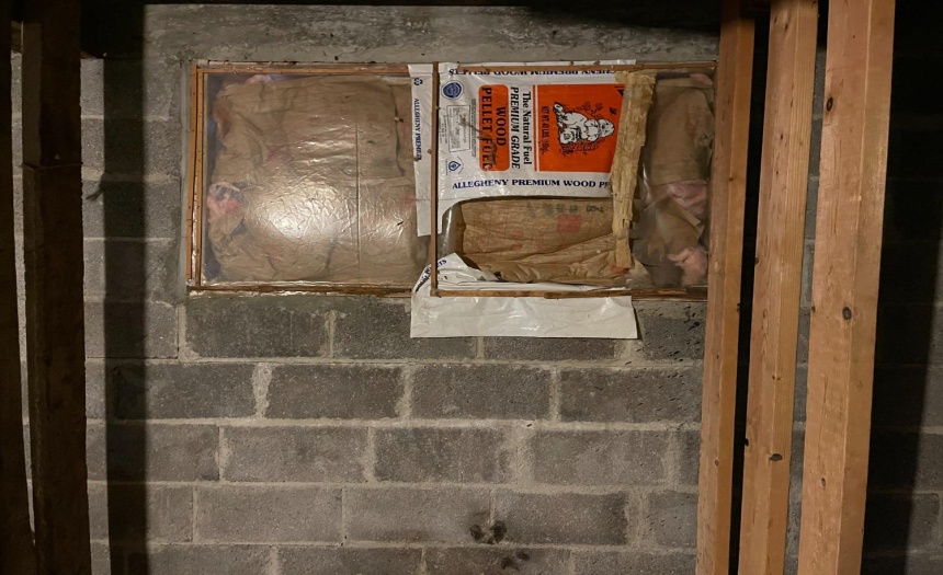 Insulated covered windows in basement