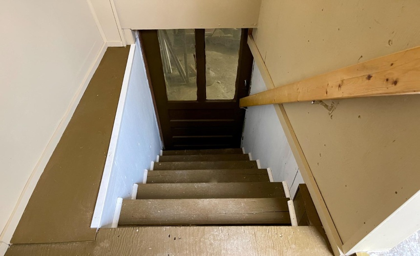 Steps to the unfinished basement
