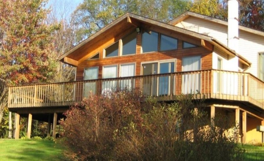 Window wall overlooks wrap deck