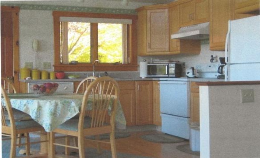 Oak cabinets, hardwood floors.