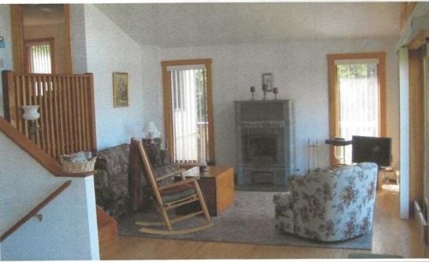 Living room with impressive Soap stone stove