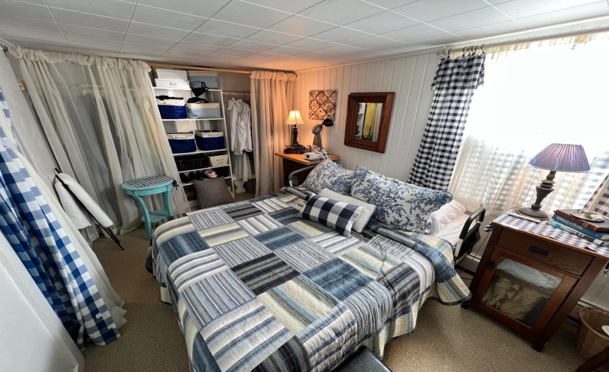 Bedroom one, sun-splashed with southern light.