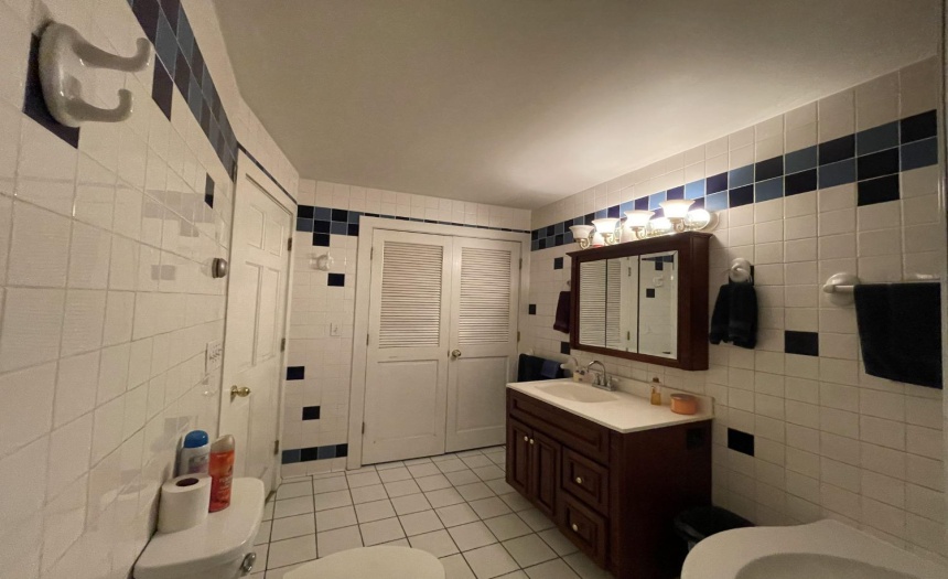 There are washer and dryer hook ups behind the white closet doors