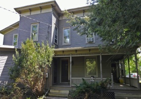 Front of the home (rarely seen). Wrap porch, mega private (hidden from the road by hedges)