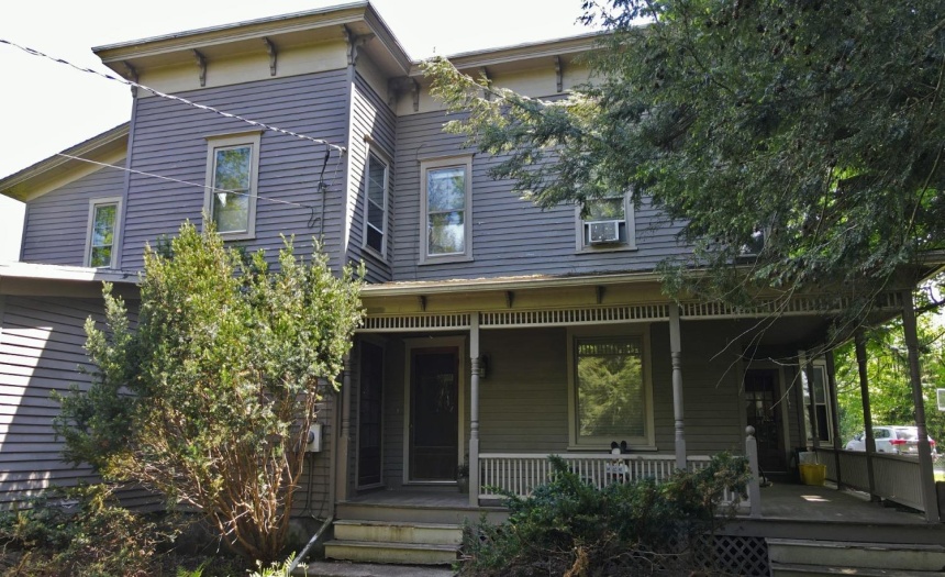 Front of the home (rarely seen). Wrap porch, mega private (hidden from the road by hedges)