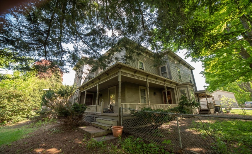 Another view of the porch steps and front side of house