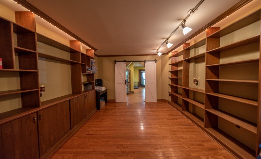 Door in the foreground (sliding barn doors) enter into the formal dining room