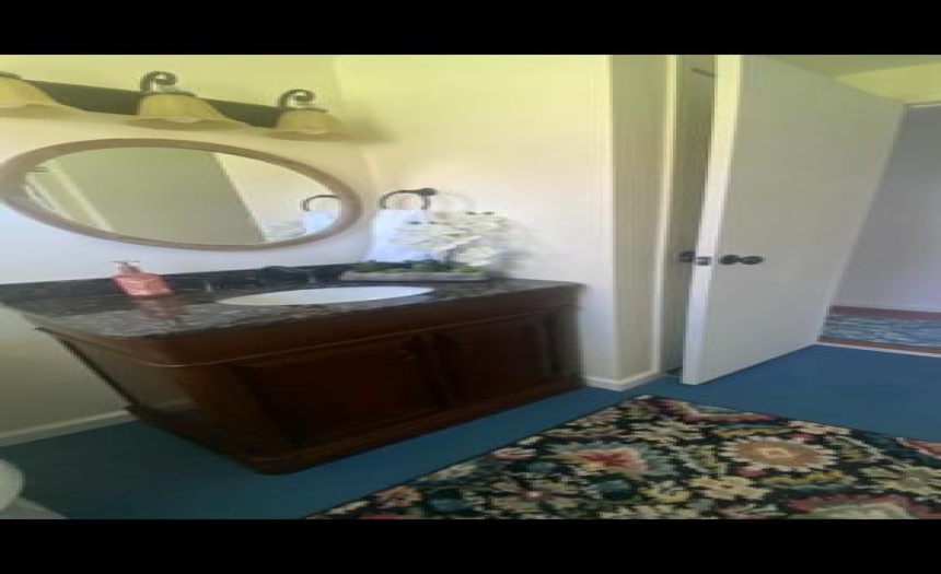 Sweet vanity in updated bath on first floor