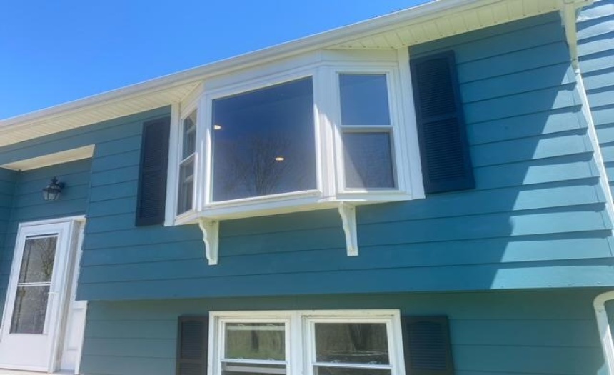 Great bay window gives views of the country lot