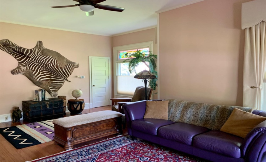 Living room just of the foyer, through French doors
