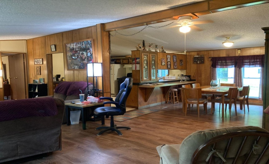 Open floor plan from living room to dining room to kitchen