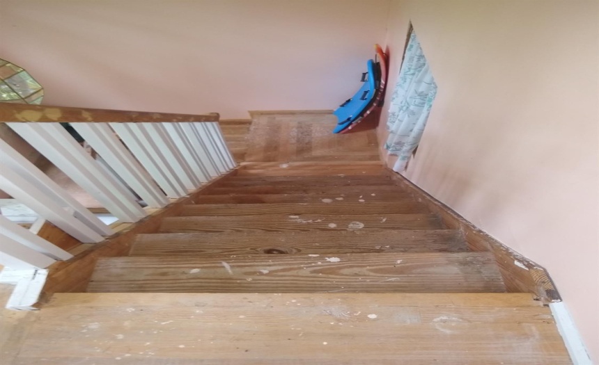 #2 staircase leading from 2nd floor to enclosed porch