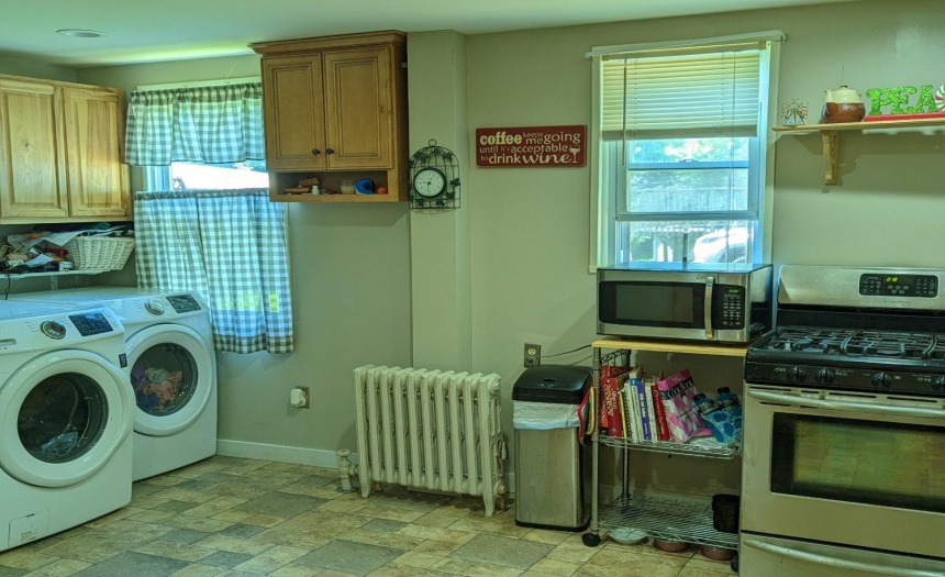 Kitchen includes laundry area
